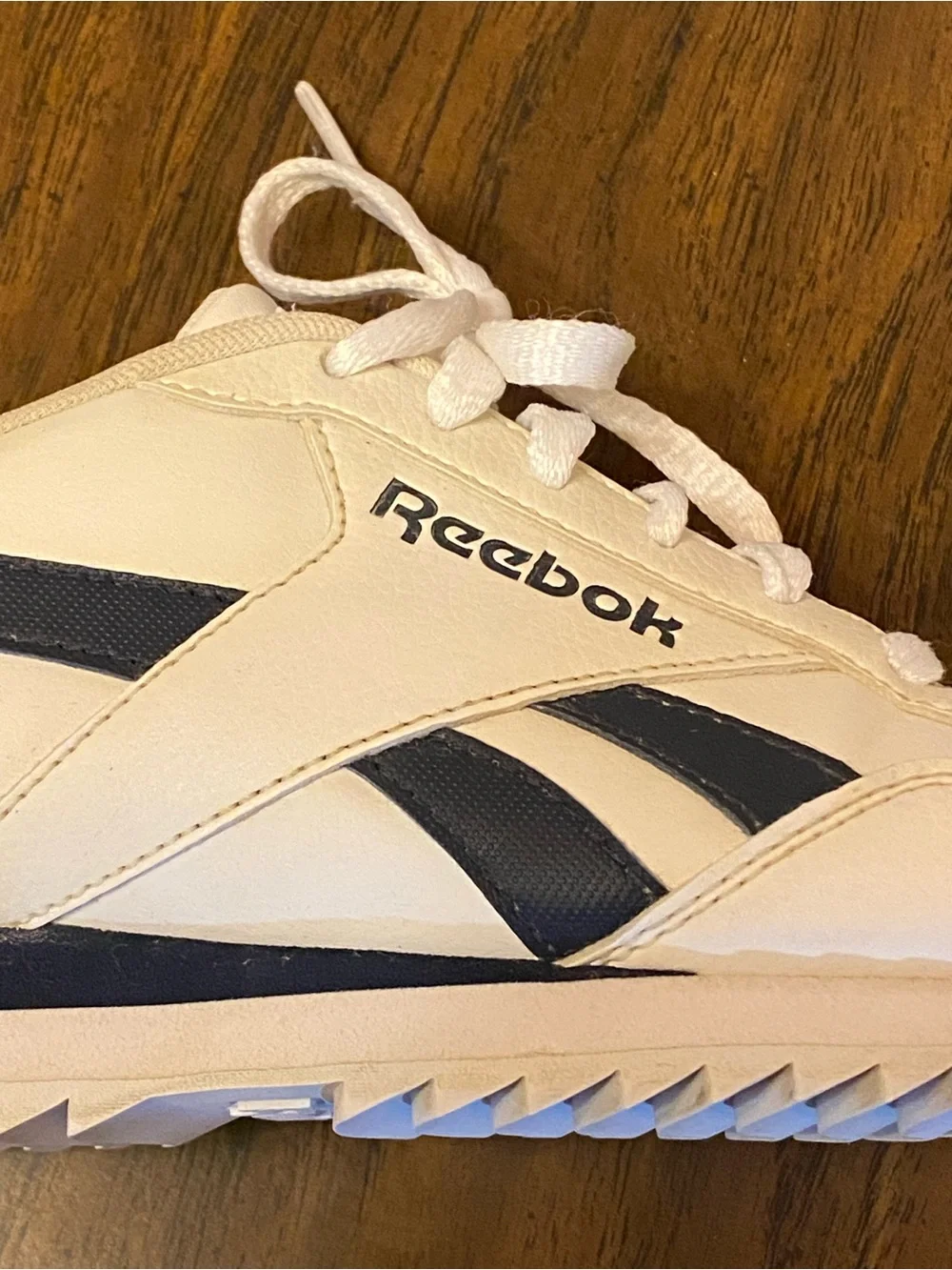 Reebok Women’s Ortholite White Athletic Sneakers with Navy Accents